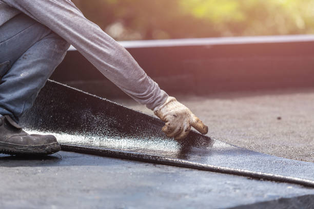 Professional Waterproofing technician working in Rochester, NY